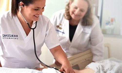 LPN to ADN Nursing Student with Teacher Using a Stethoscope